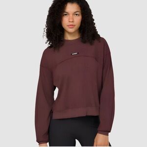 Bandit Running women’s Versa Rib Mockneck pullover in Spice color